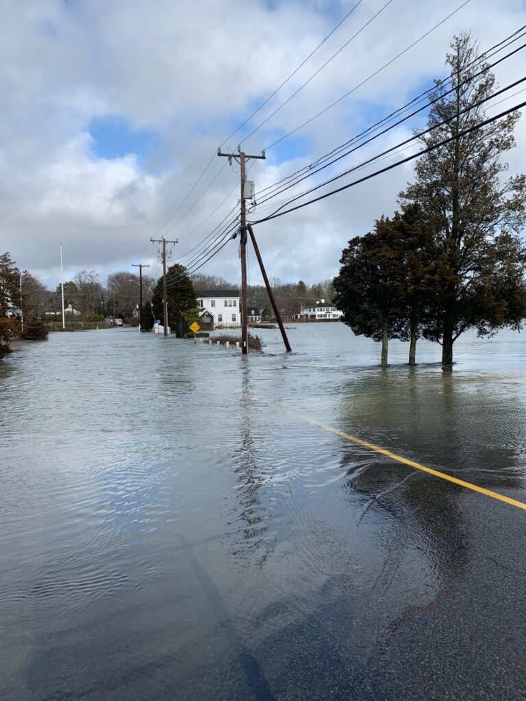 a flooded street with power lines (MyCoast AI)