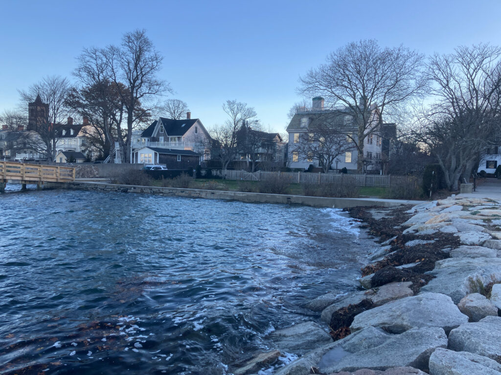 a river with rocks and buildings along it (MyCoast AI)