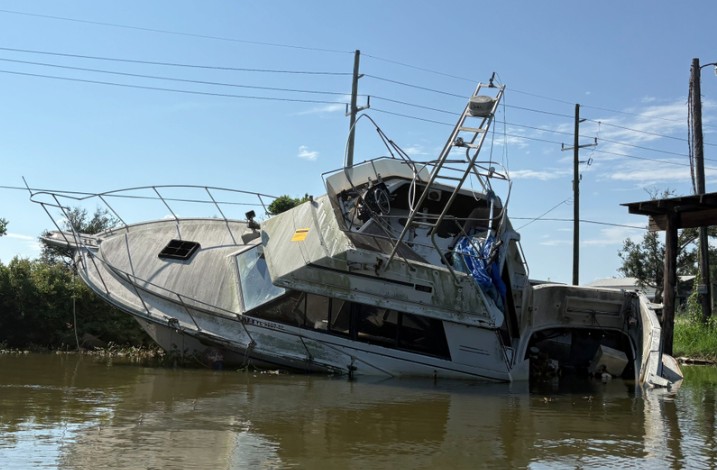 a wrecked boat in a river (MyCoast AI)