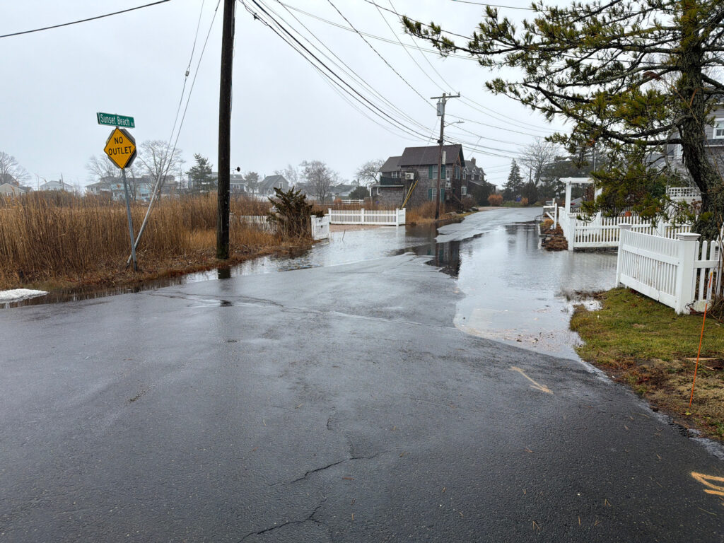 a flooded street with power lines (MyCoast AI)