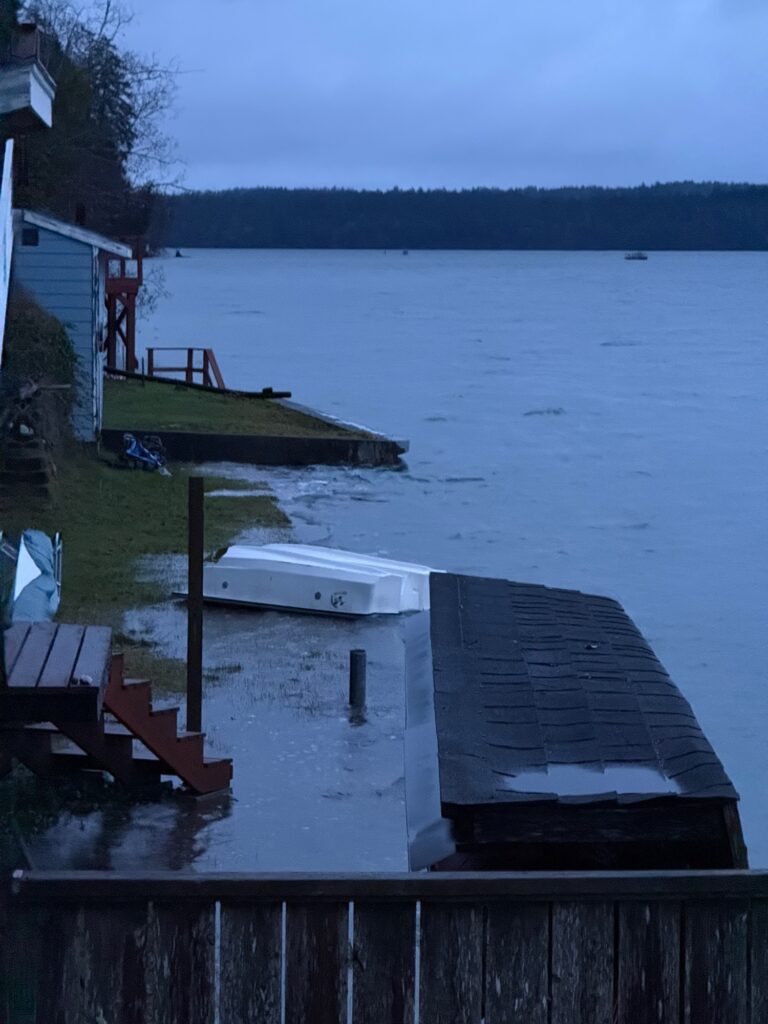 a dock with a boat in the water (MyCoast AI)
