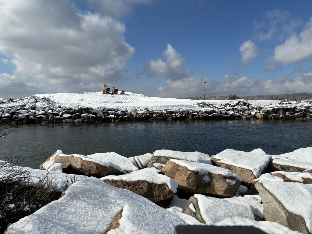 a rocky shoreline with snow (MyCoast AI)