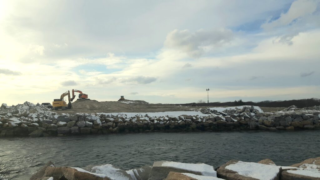 a rocky shore with a crane (MyCoast AI)