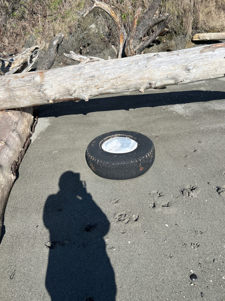 a tire on the ground (MyCoast AI)