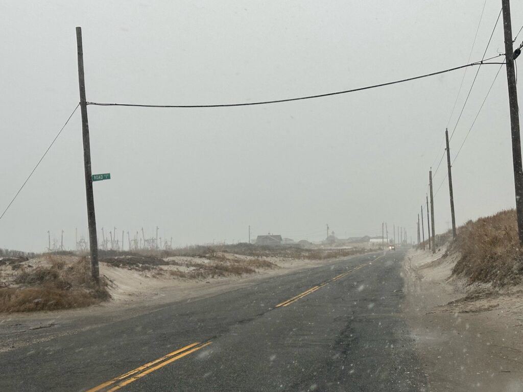 a road with power lines on the side (MyCoast AI)