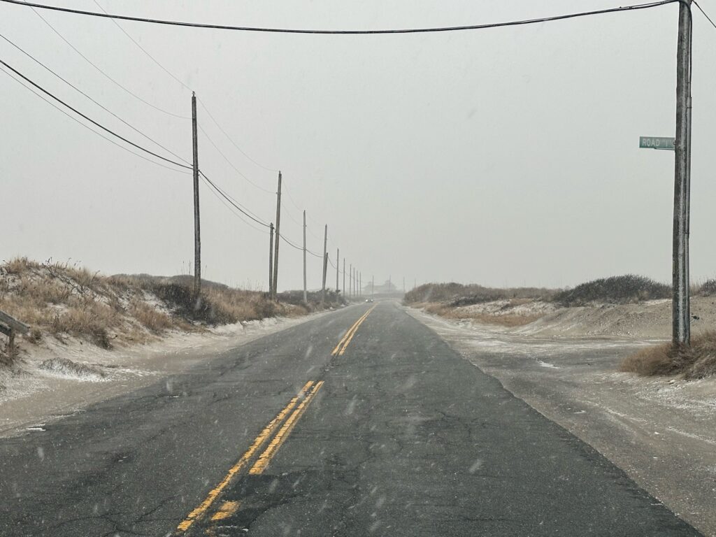 a road with power lines on the side (MyCoast AI)
