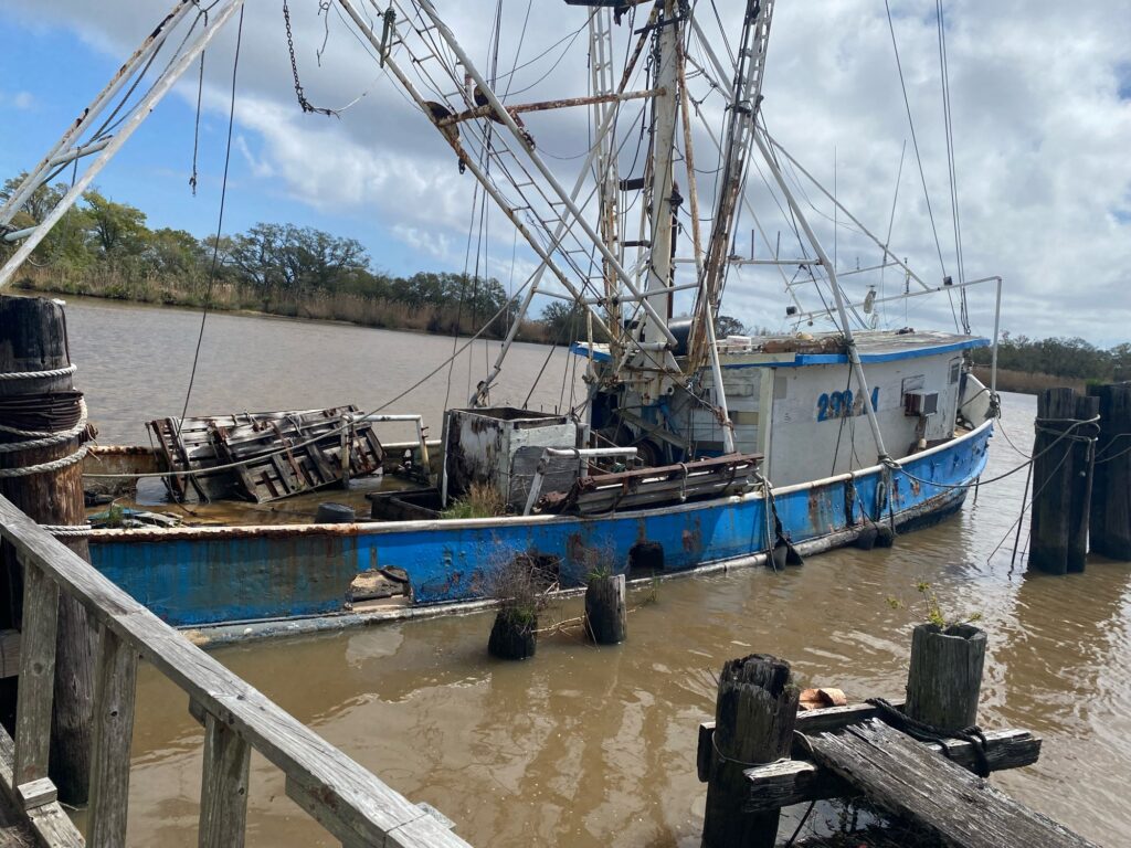 a boat docked at a pier (MyCoast AI)
