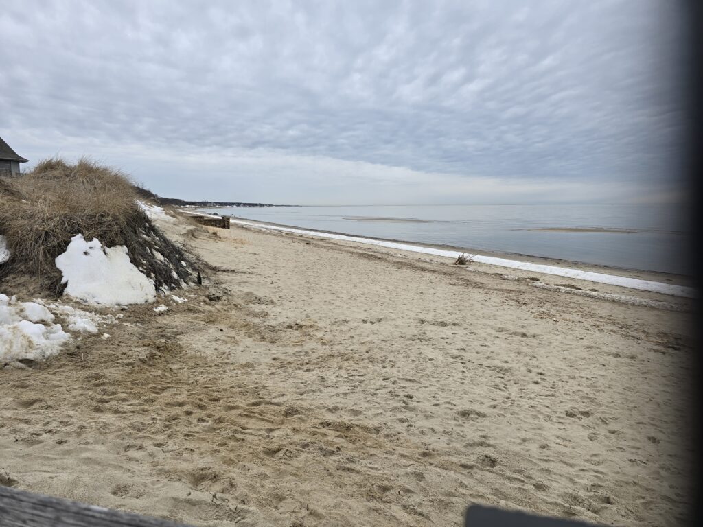 a sandy beach with snow (MyCoast AI)