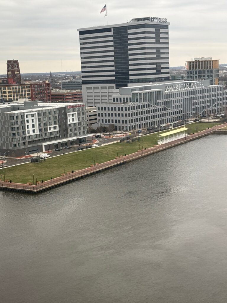 a body of water with buildings along it (MyCoast AI)