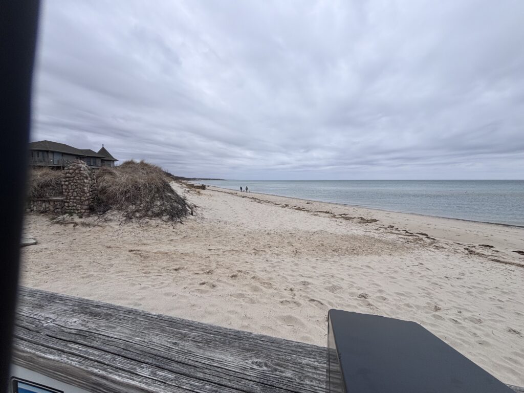 a sandy beach with a house (MyCoast AI)