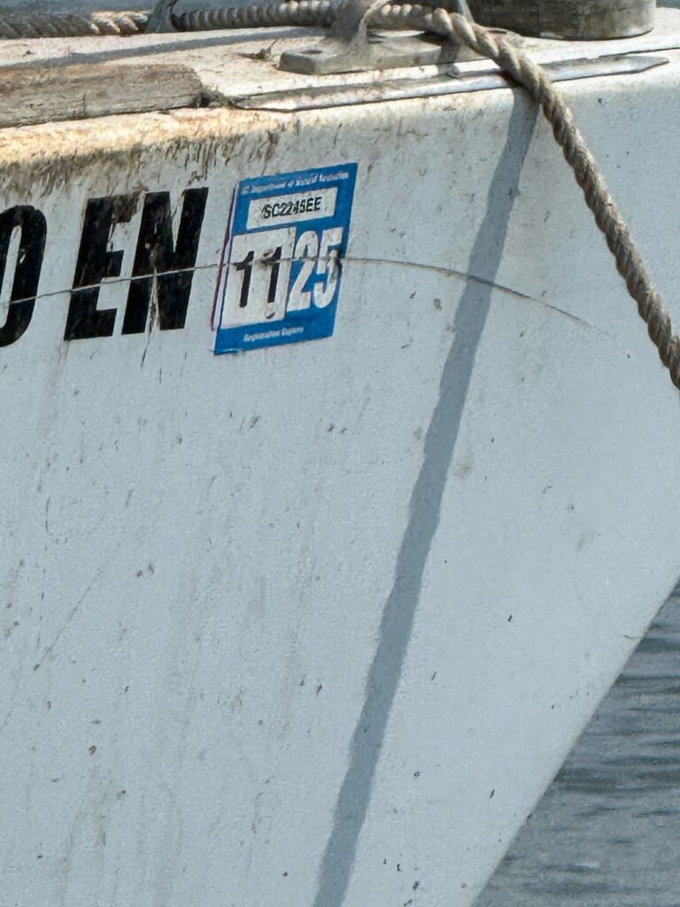 a sign on a wall (MyCoast AI)