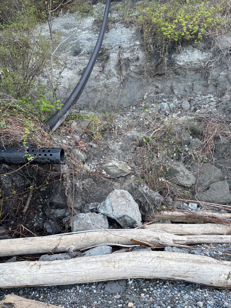 a pipe going through a ditch (MyCoast AI)