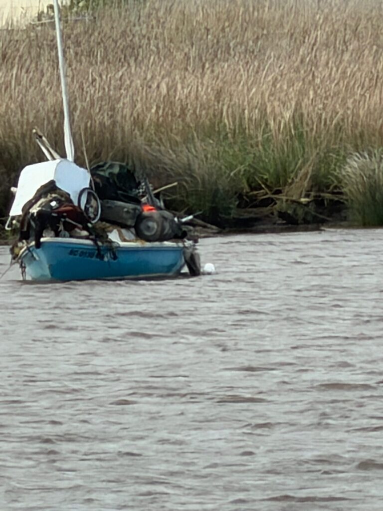 a boat with a motor attached (MyCoast AI)