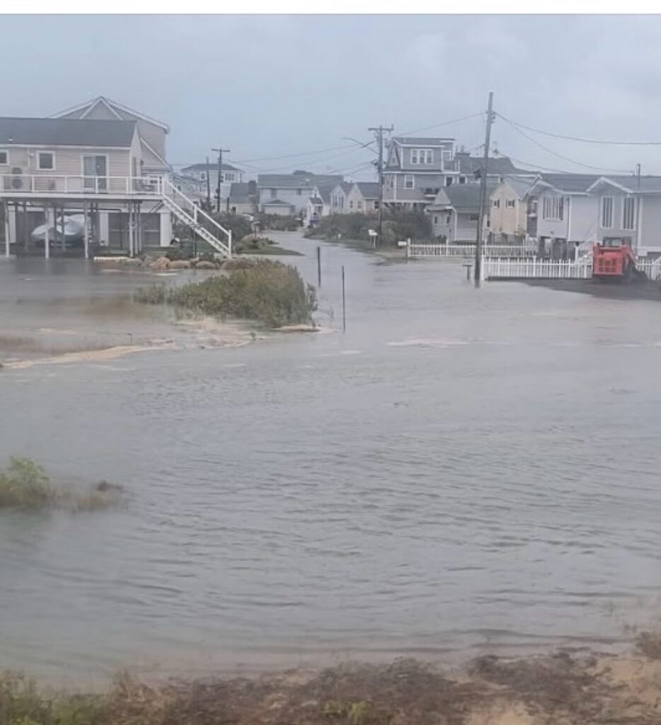 a flooded area with buildings and a bridge (MyCoast AI)