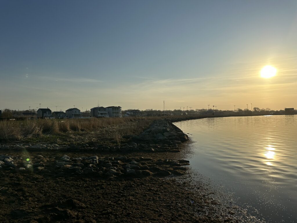 a body of water with buildings along it (MyCoast AI)