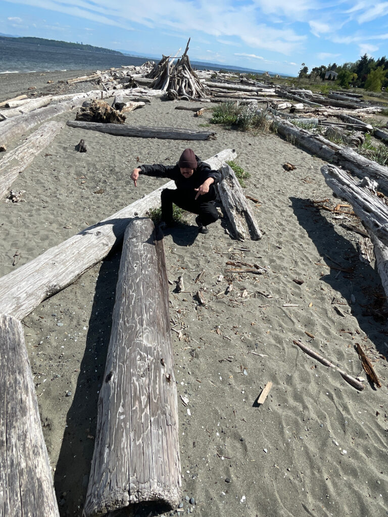 a person sitting on a rock (MyCoast AI)