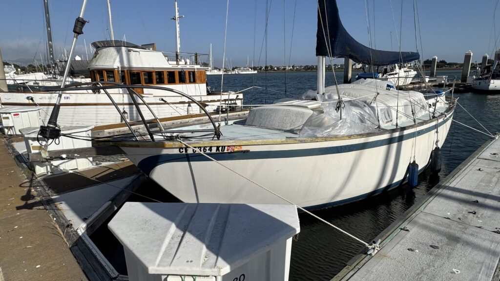 a boat docked at a pier (MyCoast AI)