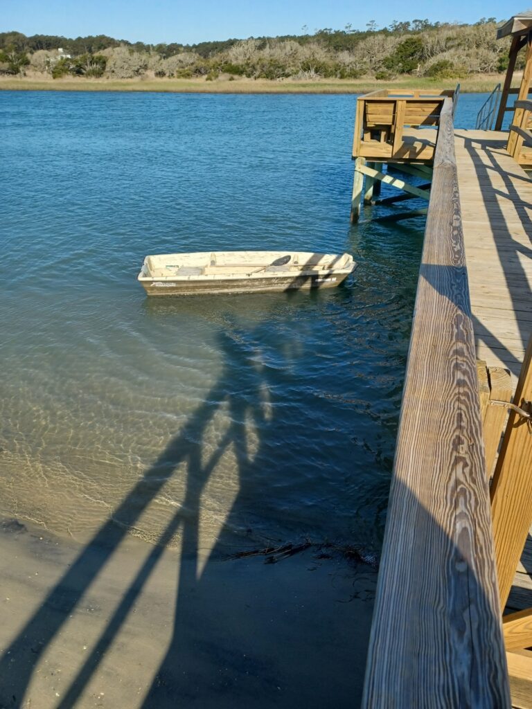 a boat sits in the water (MyCoast AI)