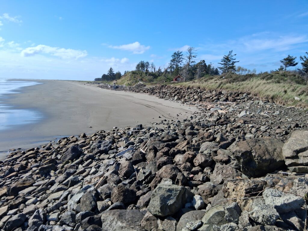 a rocky beach with a road (MyCoast AI)