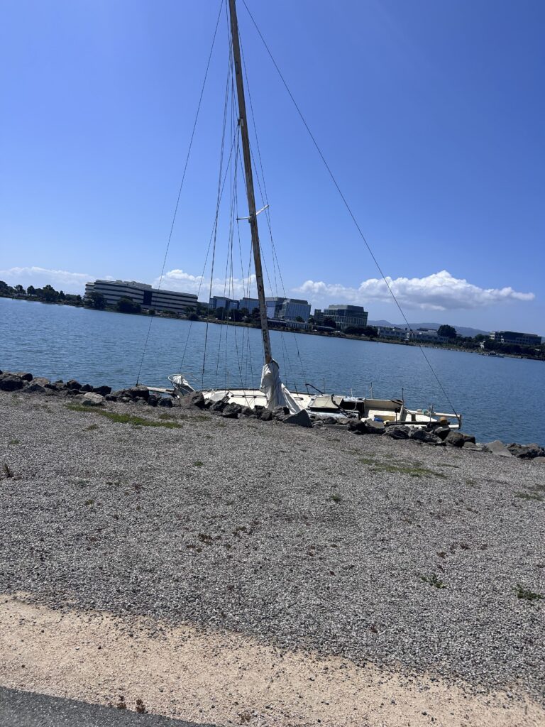 a sailboat on a beach (MyCoast AI)