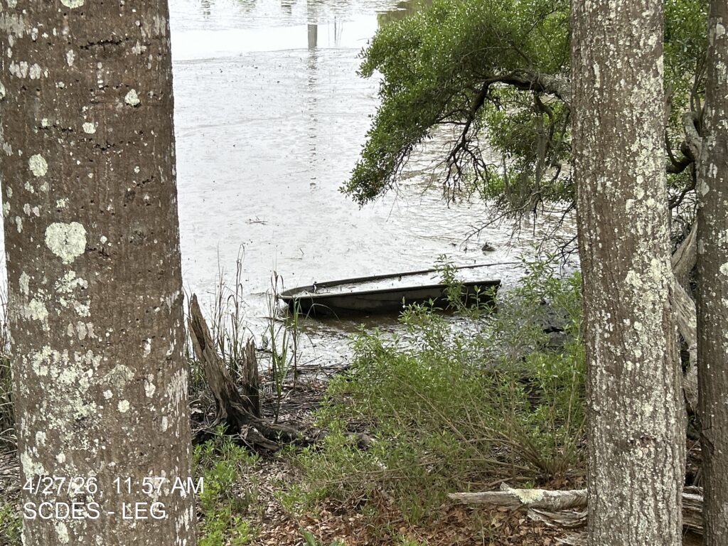 a boat sits in the water (MyCoast AI)